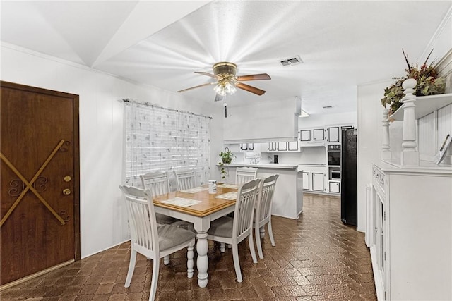 dining area with ceiling fan