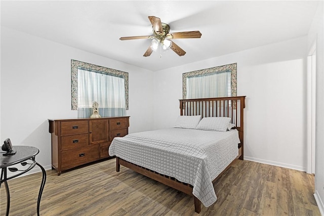 bedroom featuring hardwood / wood-style flooring and ceiling fan