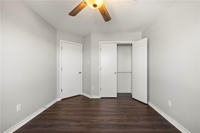 unfurnished bedroom with a ceiling fan, a closet, baseboards, and wood finished floors