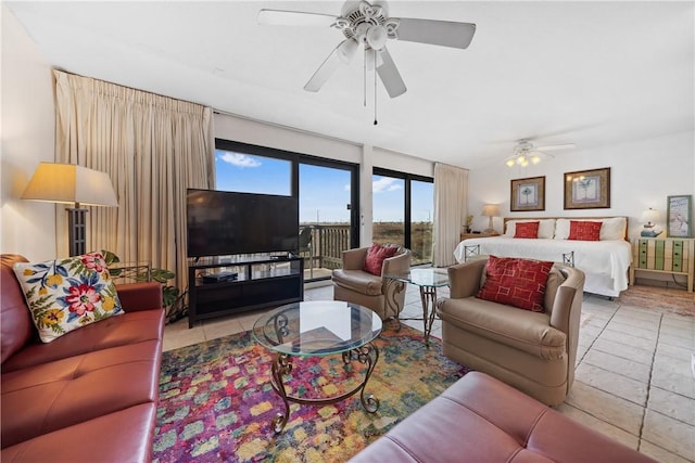 tiled living room featuring ceiling fan