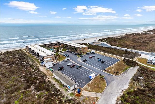 aerial view with a view of the beach and a water view