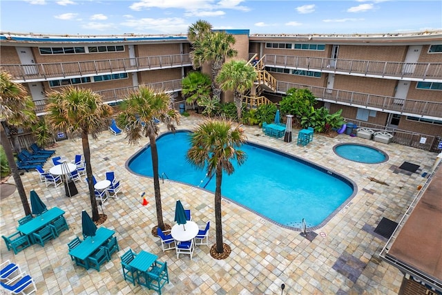 view of pool featuring a patio area