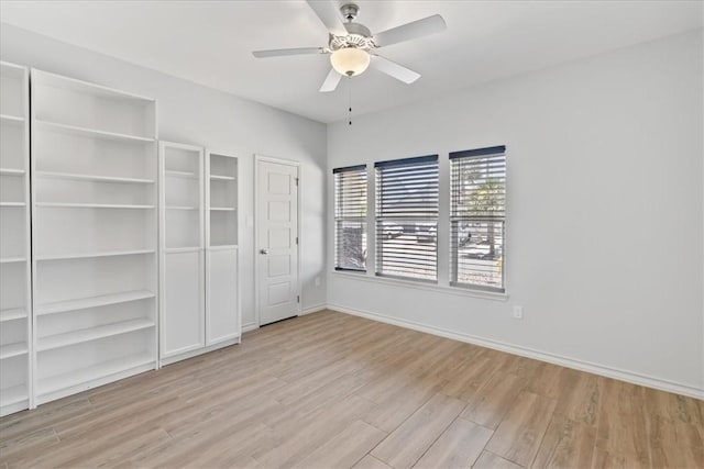 15101 Tesoro Dr, Corpus Christi, TX 78418 - unfurnished bedroom with wood finished floors and a ceiling fan