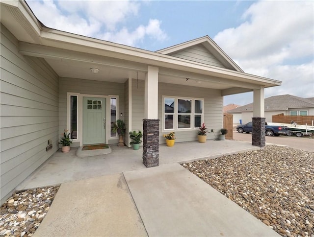 property entrance with a porch