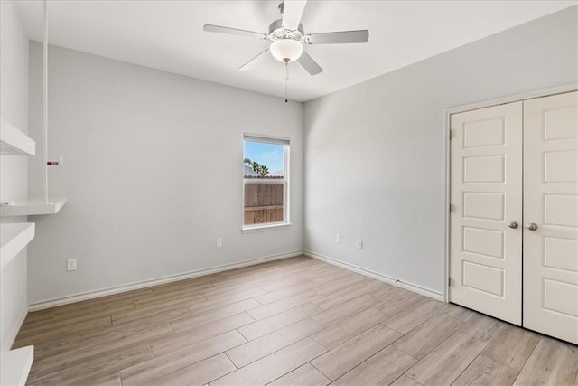15101 Tesoro Dr, Corpus Christi, TX 78418 - unfurnished living room with light wood finished floors and a ceiling fan