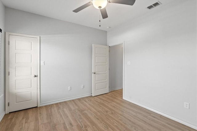 15101 Tesoro Dr, Corpus Christi, TX 78418 - empty room featuring a ceiling fan and light wood-style flooring