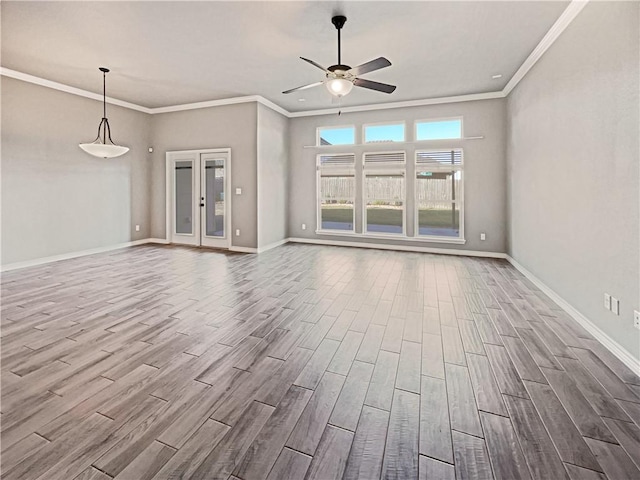 unfurnished living room with hardwood / wood-style floors, ceiling fan, and ornamental molding