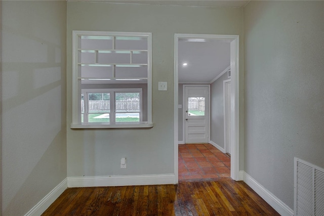 foyer entrance with dark wood-type flooring