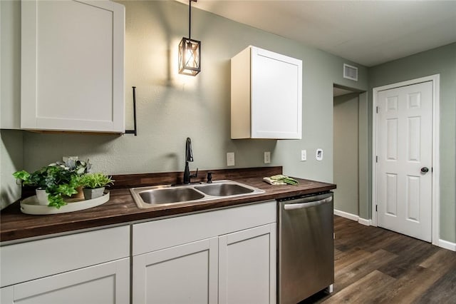 950 Susan Dr, Corpus Christi, TX 78412 - kitchen featuring dishwasher, wood counters, a sink, white cabinets, and dark wood finished floors