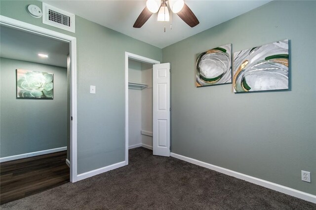 950 Susan Dr, Corpus Christi, TX 78412 - unfurnished bedroom with dark colored carpet, baseboards, a ceiling fan, and a closet