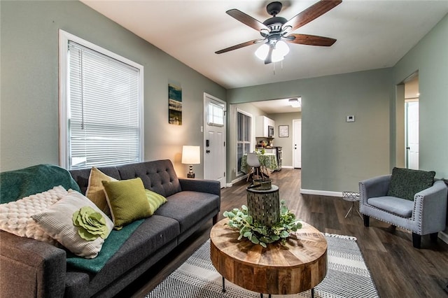 950 Susan Dr, Corpus Christi, TX 78412 - living room with dark wood-style floors, a ceiling fan, and baseboards