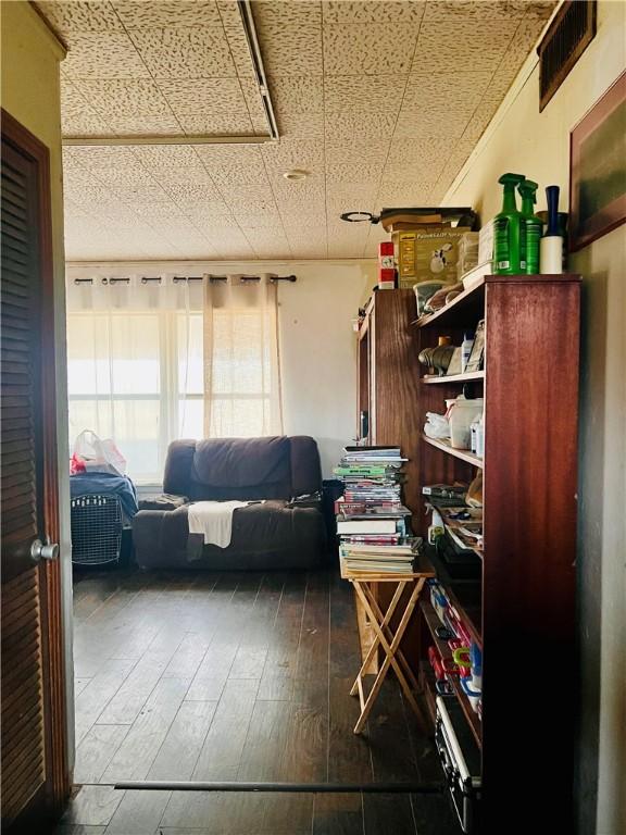 interior space with dark hardwood / wood-style floors