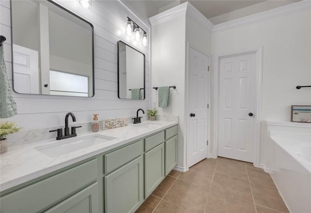 bathroom featuring vanity, tile patterned floors, and a tub to relax in