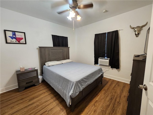 1613 6th St, Corpus Christi, TX 78404 - bedroom with baseboards, wood finished floors, and ceiling fan