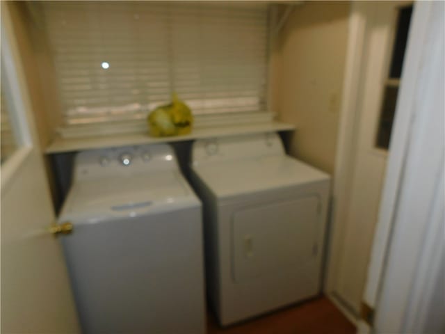 laundry room with separate washer and dryer