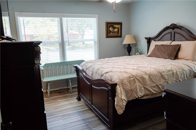1508 Roosevelt Dr, Alice, TX 78332 - bedroom featuring multiple windows and light wood-style floors