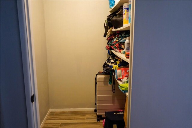1508 Roosevelt Dr, Alice, TX 78332 - walk in closet featuring wood finished floors
