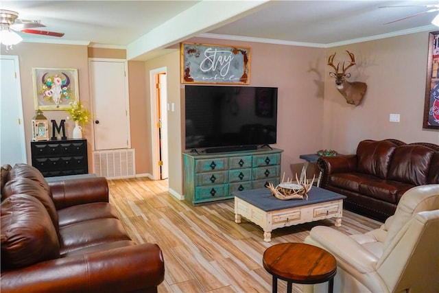 1508 Roosevelt Dr, Alice, TX 78332 - living room featuring a ceiling fan, light wood-type flooring, and crown molding