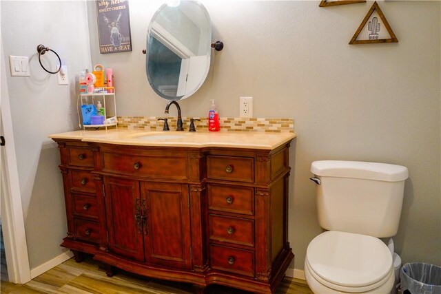 1508 Roosevelt Dr, Alice, TX 78332 - bathroom featuring vanity and wood finished floors