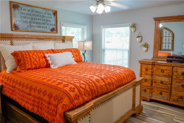 1508 Roosevelt Dr, Alice, TX 78332 - bedroom with wood finished floors and ceiling fan