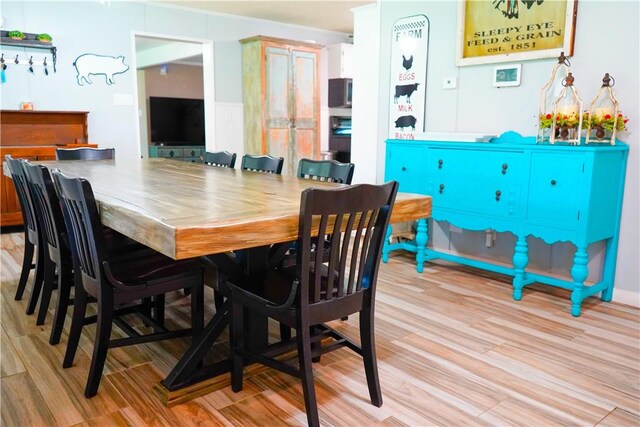 1508 Roosevelt Dr, Alice, TX 78332 - dining room featuring light wood-type flooring