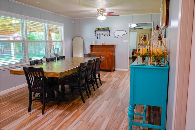 1508 Roosevelt Dr, Alice, TX 78332 - dining area featuring crown molding, a ceiling fan, and light wood finished floors