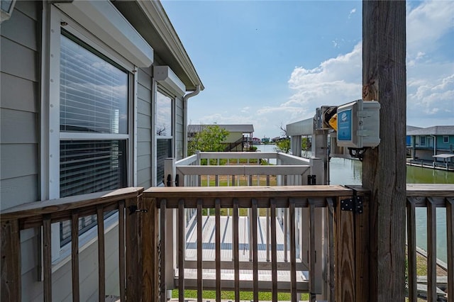 balcony featuring a water view