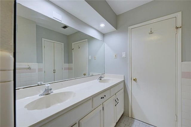 bathroom featuring vanity and tile patterned floors