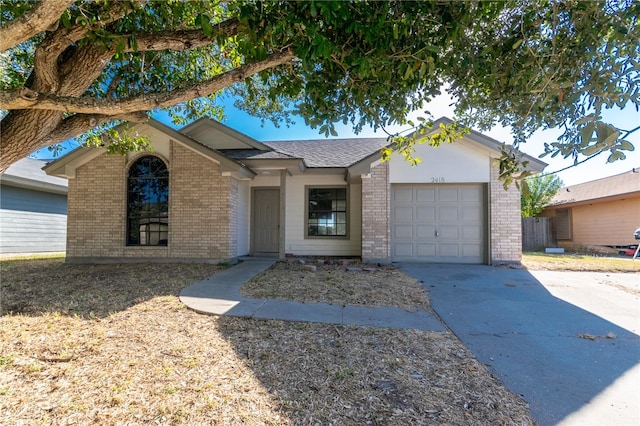 ranch-style home with a garage