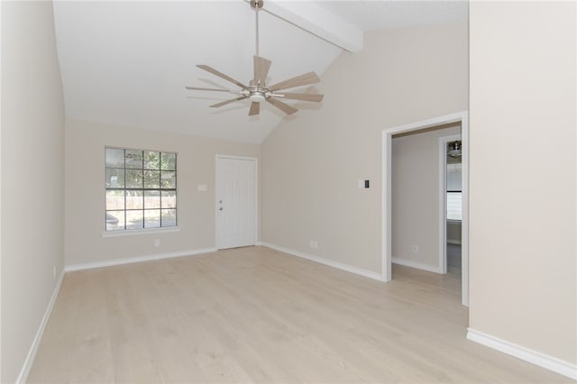 empty room with ceiling fan, light hardwood / wood-style flooring, and lofted ceiling with beams