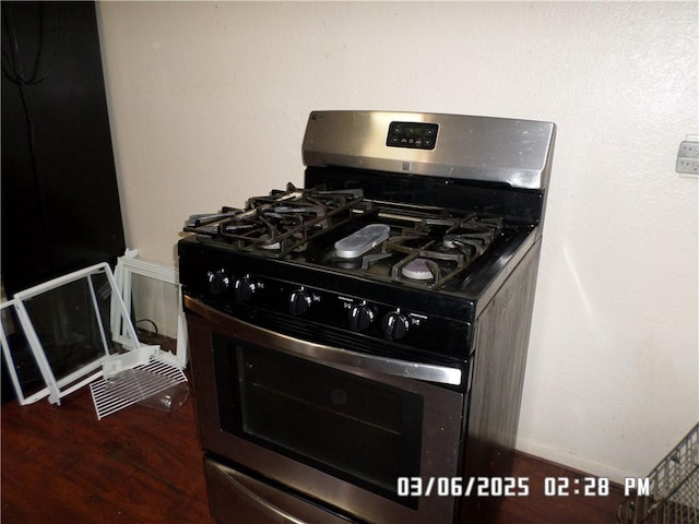 room details with wood finished floors and gas stove