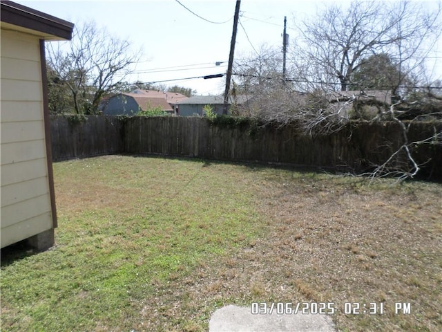 view of yard with fence