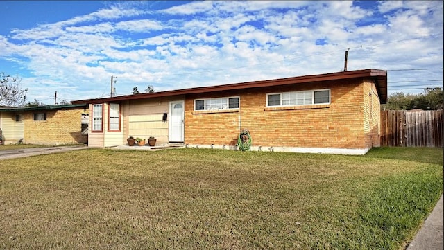 ranch-style house with a front yard