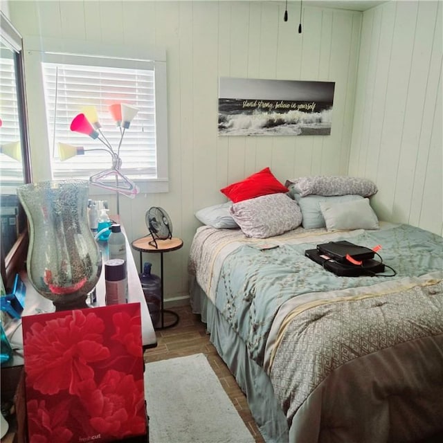 bedroom featuring wood finished floors