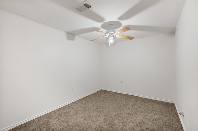 unfurnished room featuring carpet flooring and ornamental molding