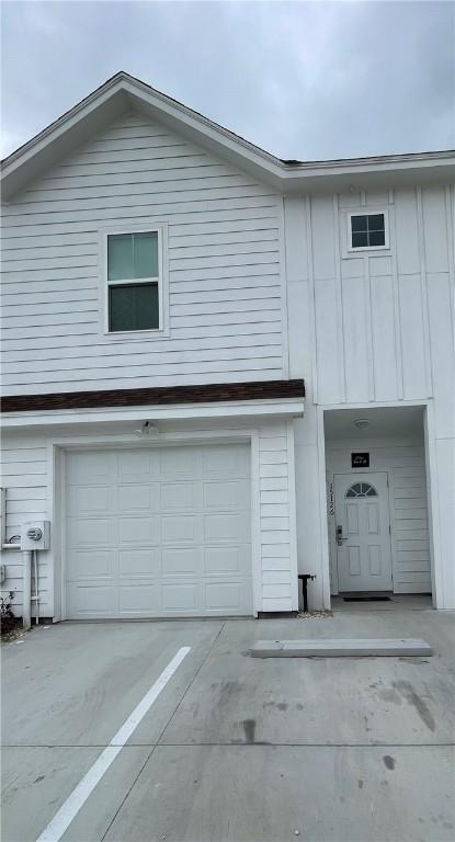 exterior space with a garage