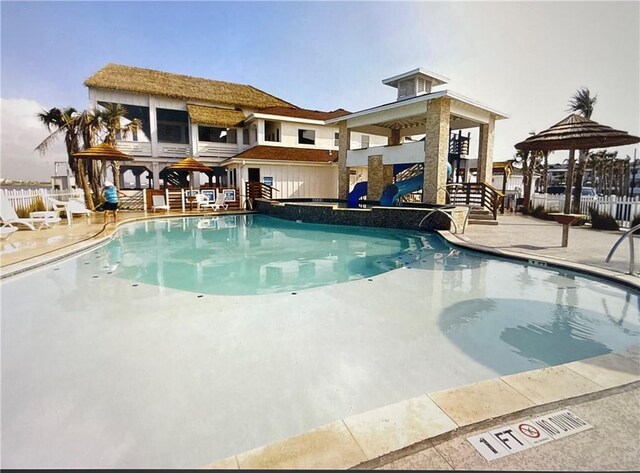 view of pool featuring a gazebo and a patio