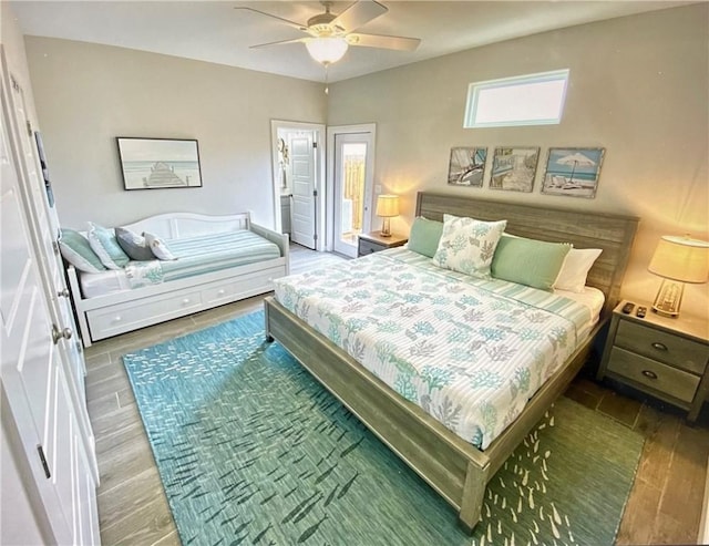 bedroom featuring dark hardwood / wood-style floors and ceiling fan