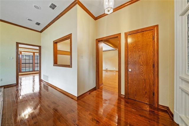 5305 Hunt Cir, Corpus Christi, TX 78413 - hallway with crown molding and hardwood / wood-style floors
