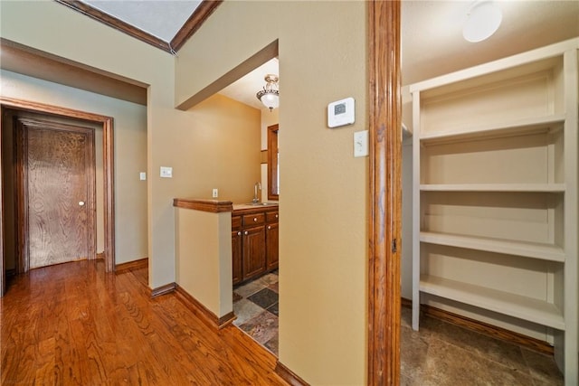 5305 Hunt Cir, Corpus Christi, TX 78413 - hallway with baseboards and dark wood-style floors