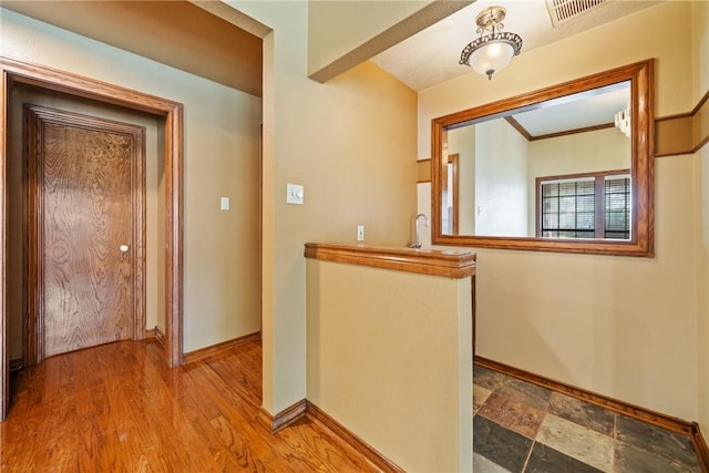 5305 Hunt Cir, Corpus Christi, TX 78413 - hall featuring baseboards and a sink