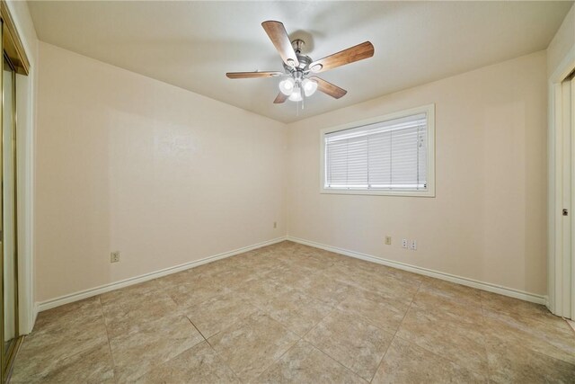 5305 Hunt Cir, Corpus Christi, TX 78413 - empty room with baseboards and a ceiling fan