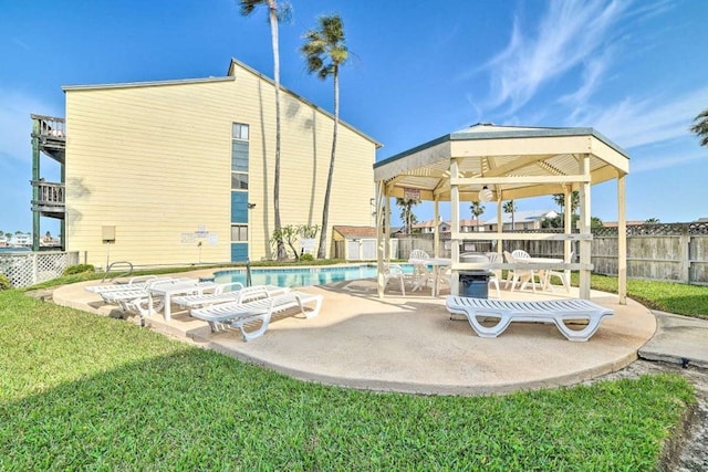exterior space with a gazebo and a yard