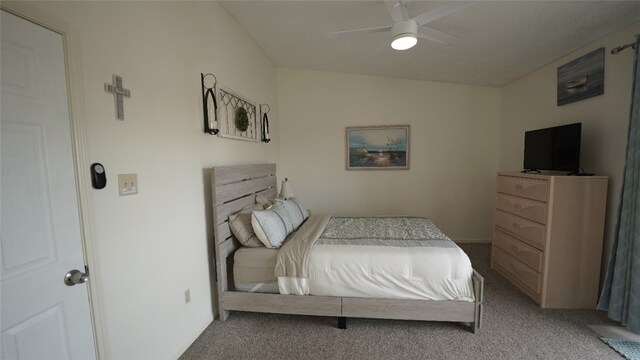 bedroom with light colored carpet and ceiling fan