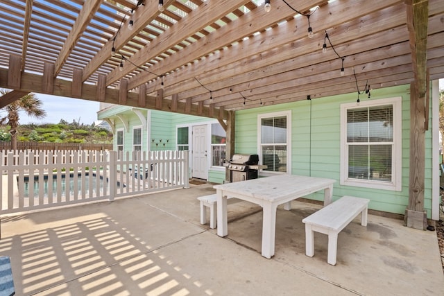 view of patio with a pergola and grilling area