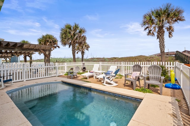 view of pool with a patio and a pergola