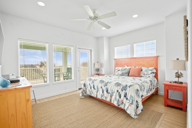 bedroom with light wood-type flooring and ceiling fan