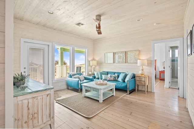 sunroom / solarium with wood ceiling