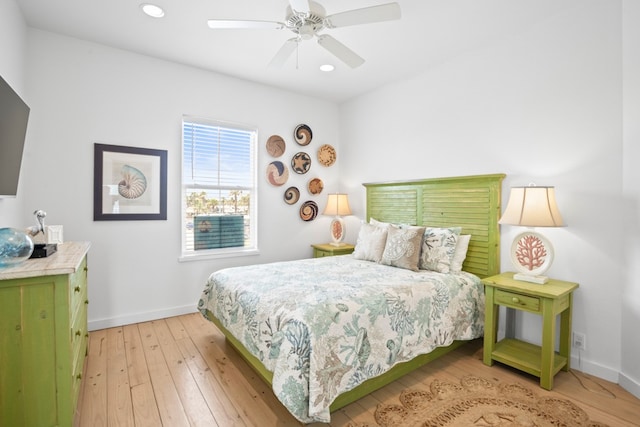 bedroom featuring light wood-type flooring and ceiling fan