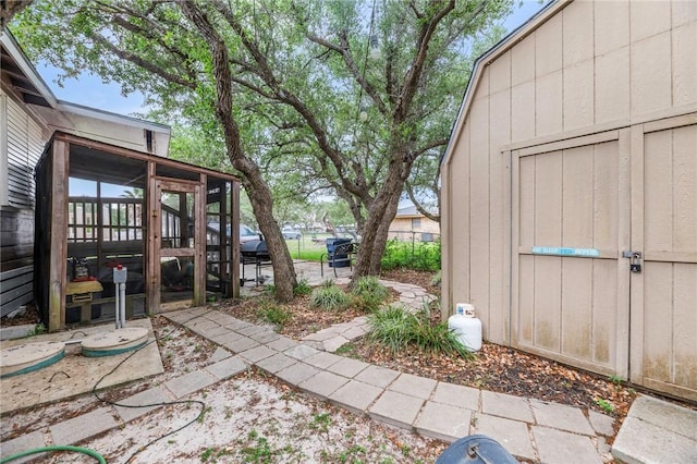 245 Griffith Dr, Rockport, TX 78382 - exterior space with fence, an outdoor structure, and a shed
